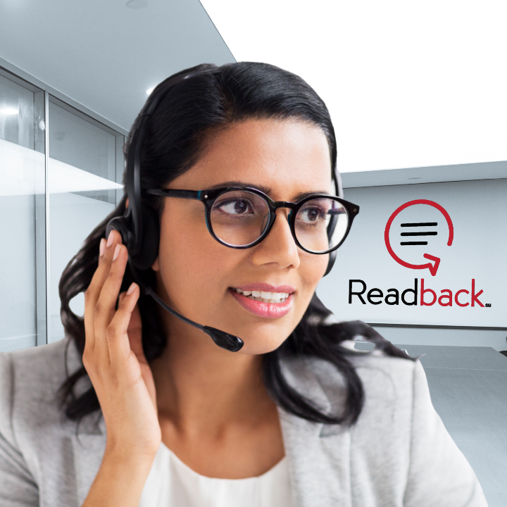 A Readback Guardian of the Record smiling wearing glasses and a headset with a microphone.