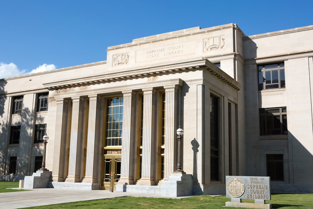 The picture features the Wyoming Supreme Court Building in Cheyenne, WY, USA.