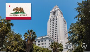 The image features Los Angeles city hall with the California state flag in the top left corner.